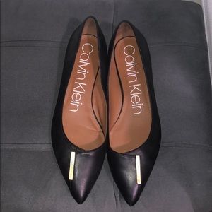Calvin Klein black flat. Worn only once!